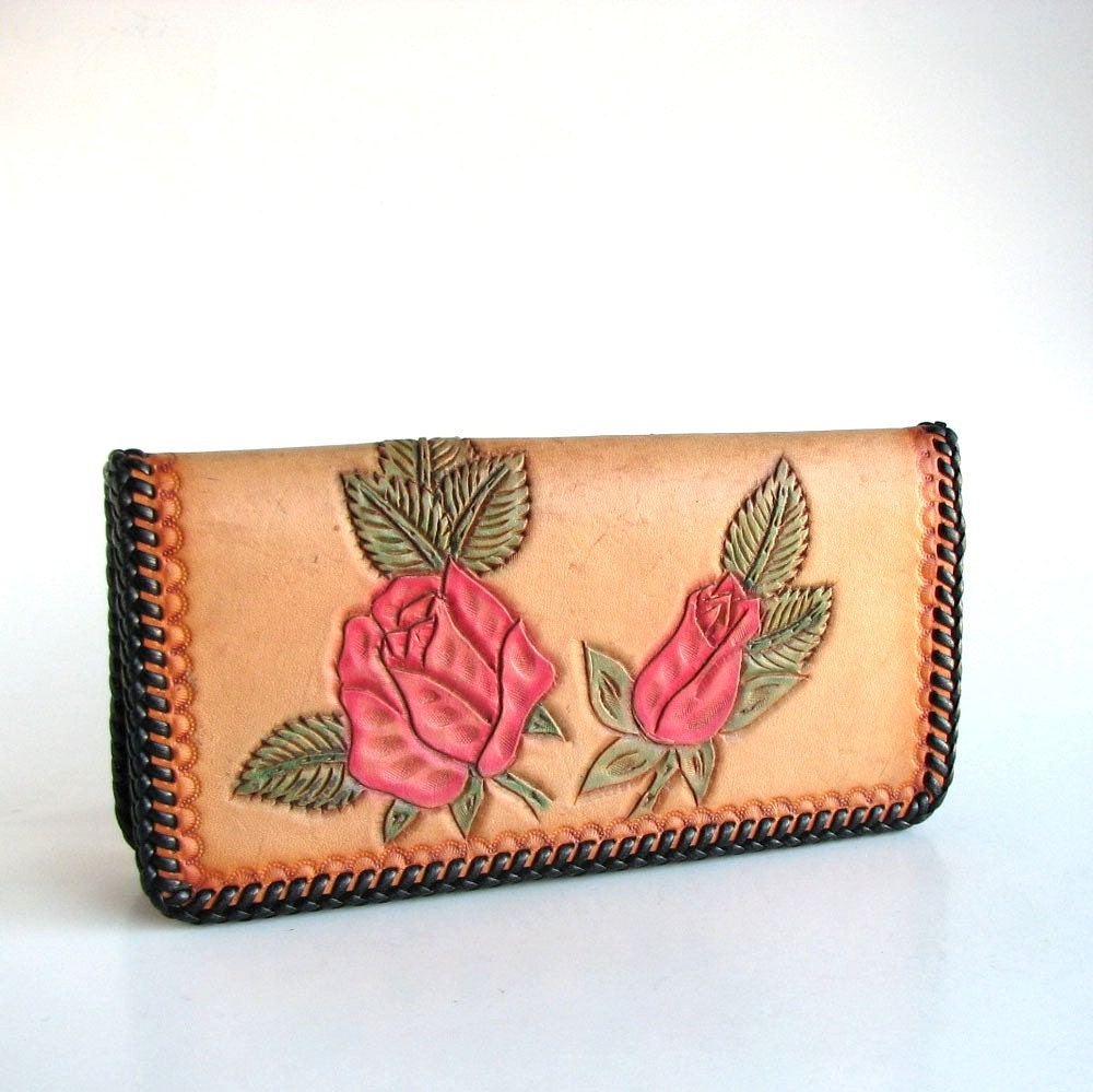 vintage hand tooled leather checkbook cover . carved by aorta