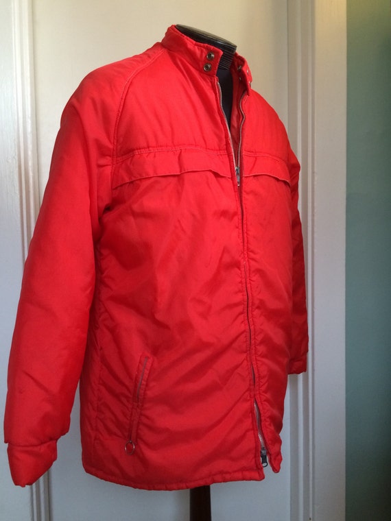 men's orange nylon ski jacket with belt / size large