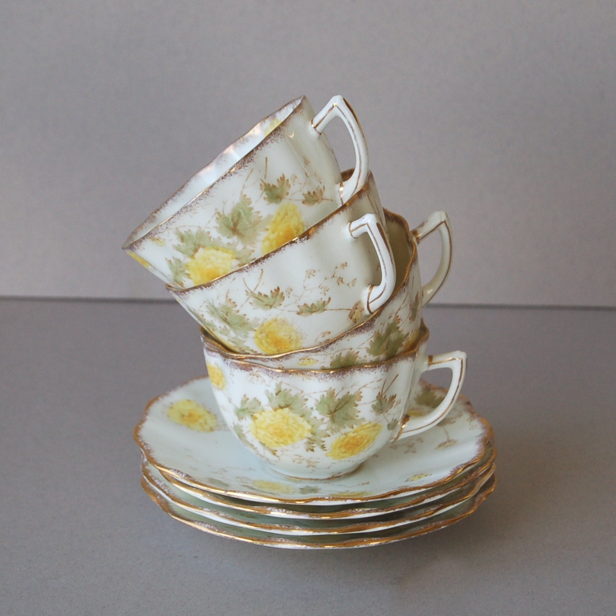 4 antique tea cups and saucers Yellow chrysanthemums floral pattern