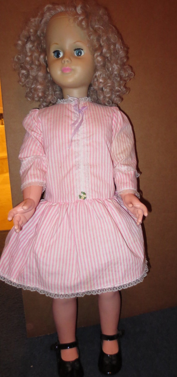 GREAT FIRST DOLL 30 inch Walker doll with blond currly hair