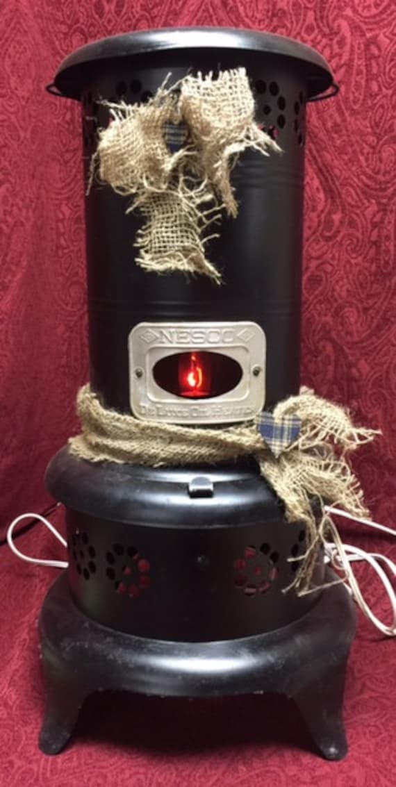 Items similar to Antique Kerosene Heater Upcycled ...