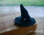 Handmade felt and catnip wizard hat cat toy.