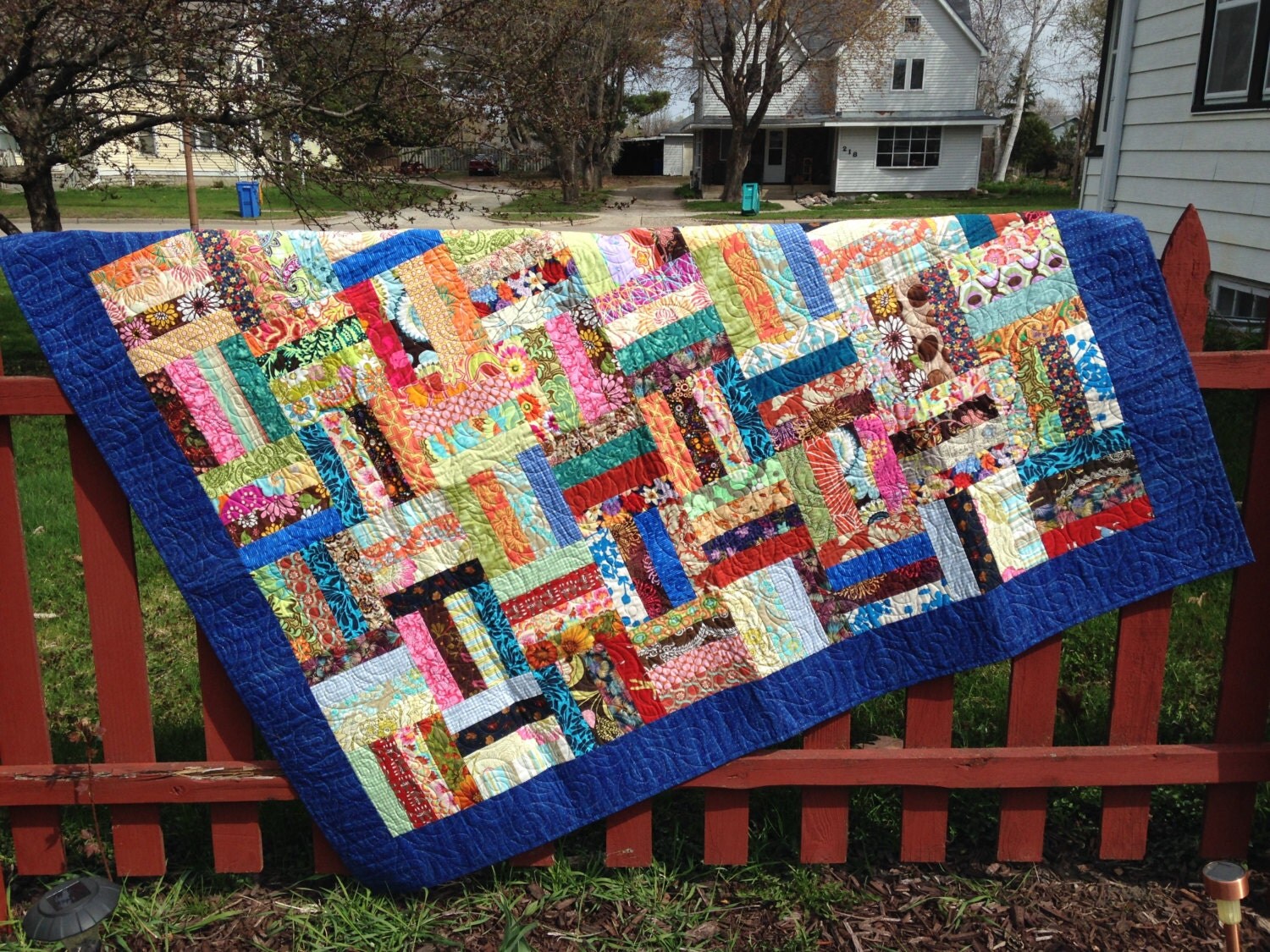 scrappy-rail-fence-lap-quilt