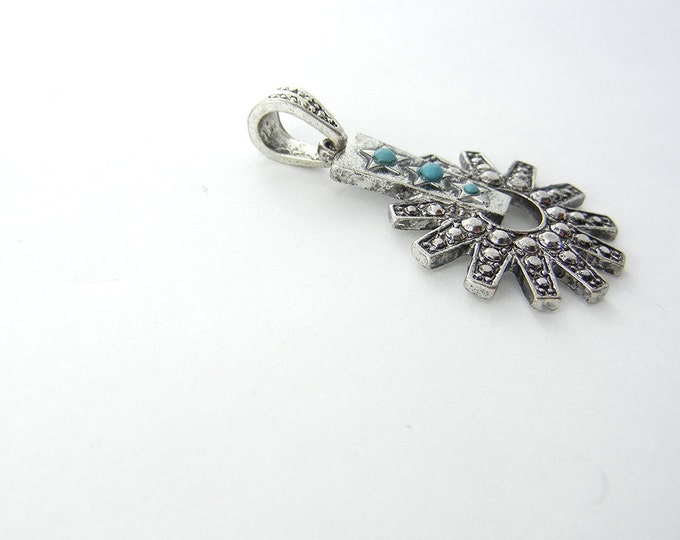 Antique Silver-tone Spur with Cut-out Pendant with Acrylic Turquoise Cabochons