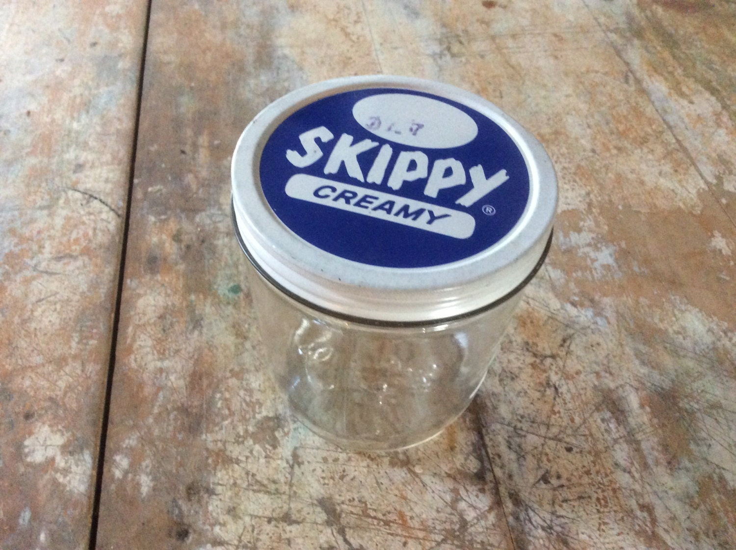 vintage Skippy Peanut Butter jar blue white clear by rustandmoth