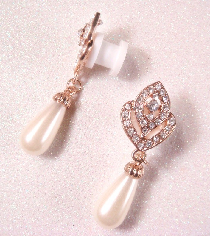 Rhinestone Wedding Gauges / rhinestone ear plugs / by misunbridal