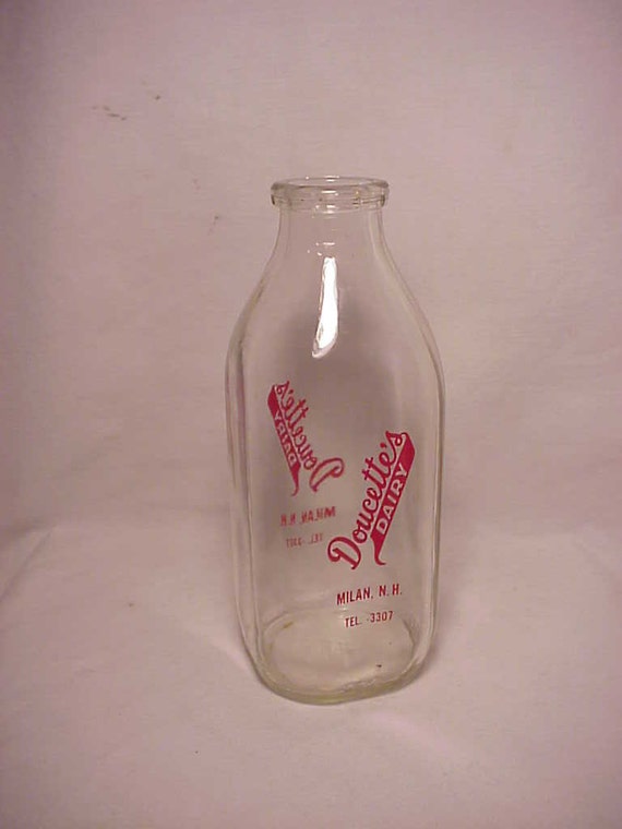 1970s Doucette's Dairy Milan N.H. Quart Milk Bottle