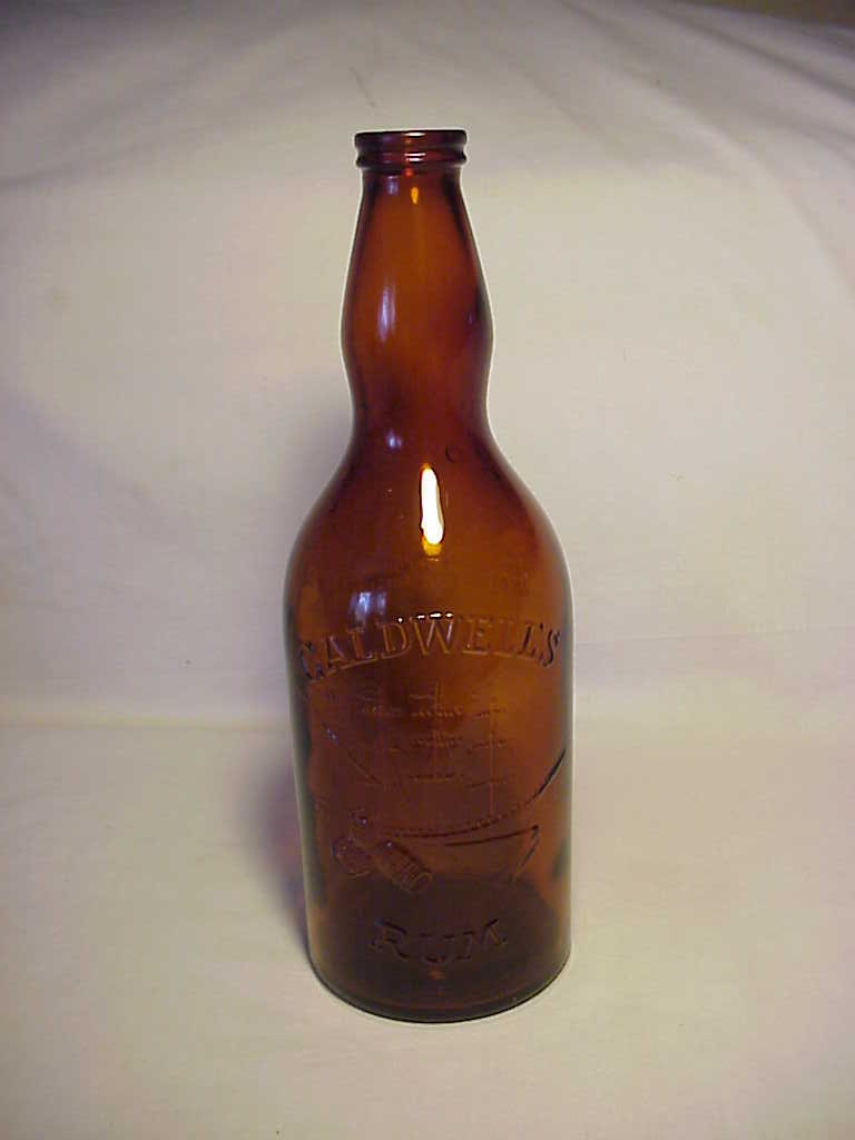c1950s Caldwell's Rum Cork top Amber Booze Bottle with