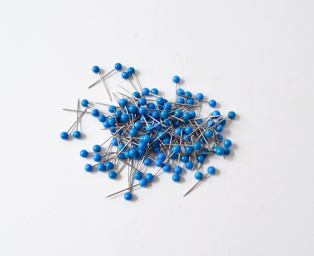 blue push pins