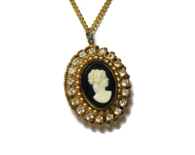 1950s Cameo rhinestone pendant, white on black celluloid, bezel set, surrounded by rhinestones, dimensional frame with chain, bride worthy
