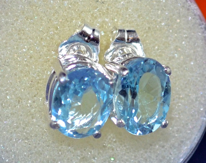 Sky Blue Topaz Studs, 8x6mm Oval, Natural, Set in Sterling Silver E716