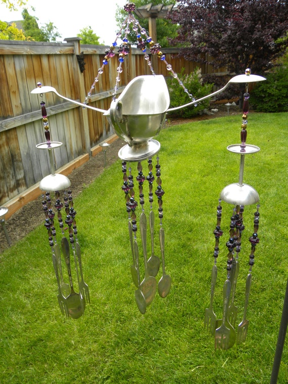 Wind chime art with assorted whimsical silver pieces funky