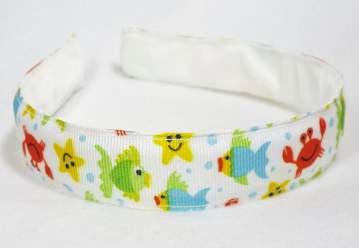 Happy Sea Creatures Headband on white grosgrain ribbon.