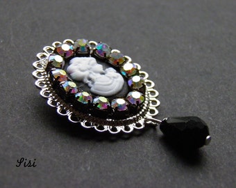 Broche argenté cabochon camée noire