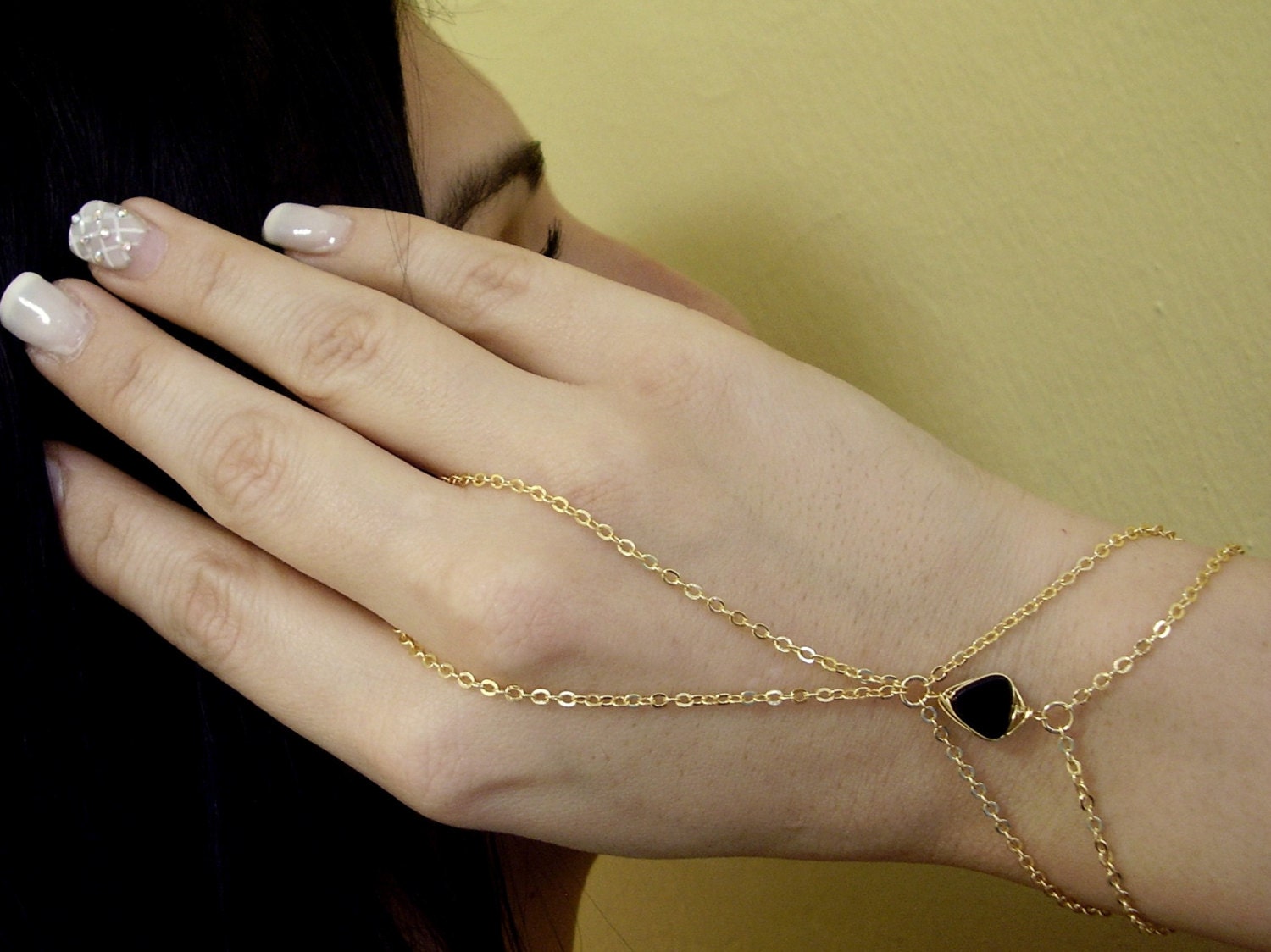 Gold slave ring hand chain with black stone Gold ring bracelet
