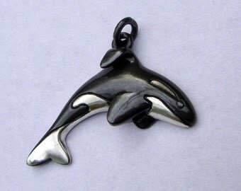 Captive Orca Killer Whale necklace, sterling silver pendant.