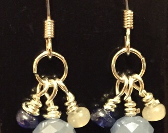Glass drop earrings with blue glass rondel beads.