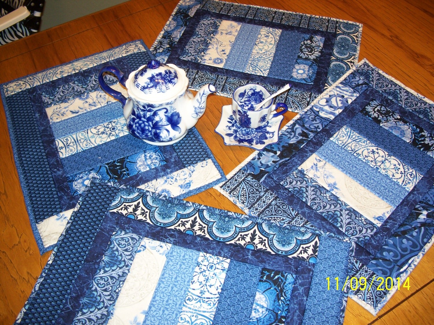Set of 4 blue placemats quilted machine washable by HandyLane
