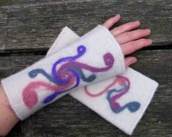 Hand knitted and felted fingerless gloves for women.