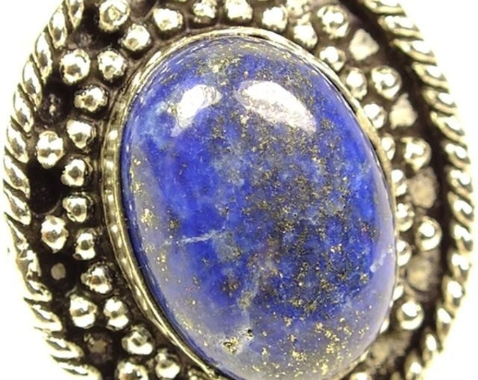 Storewide 25% Off SALE Stunning Lapis cocktail ring Featuring an oval center stone set in white metal