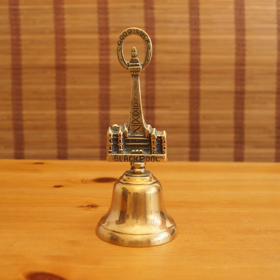 Vintage brass desk bell with decorative rod / handle