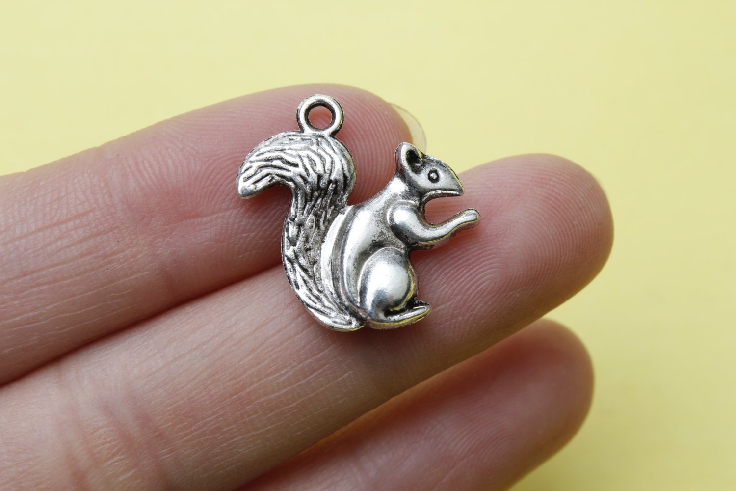 Cute Squirrel charms double sided 20 x 17mm antique silver