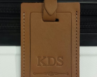 Our favorite personalized leather luggage tag. Boldly embossed and personalized with FREE initials. Simply stunning.