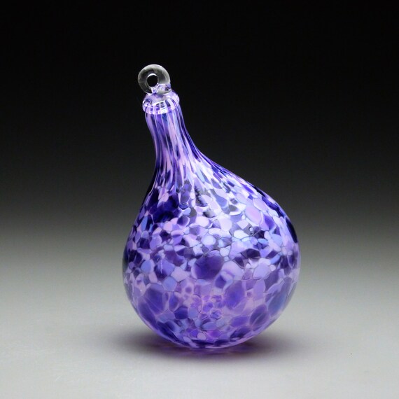 hand made blown glass christmas ornament in tones of purple hand made blown glass christmas ornament in tones of purple