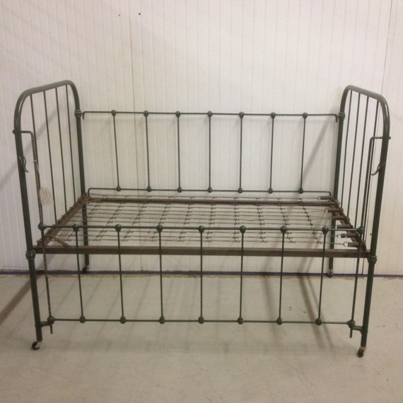 Vintage iron baby crib with springs photo prop display