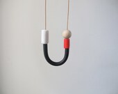 Black white and red necklace