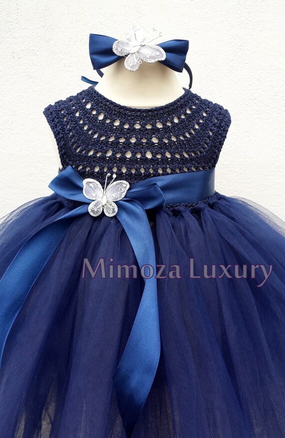 Navy tutu dress Shop Old Navy's Tutu Tank Dress for Toddler Girls: Pieced rib-knit trim at scoop neck and arm openings.,Soft-washed jersey tank top.,Sewn-in tulle-mesh tutu skirt, with smooth taffeta lining.,Tag-free label inside neck for added comfort.