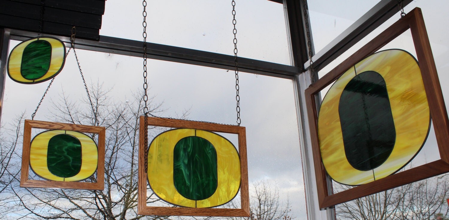 University of Oregon logo Stained glass framed window panel