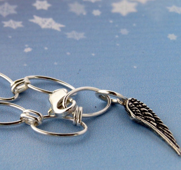 Angel wing charm bracelet made with sterling by ThePebbleJar