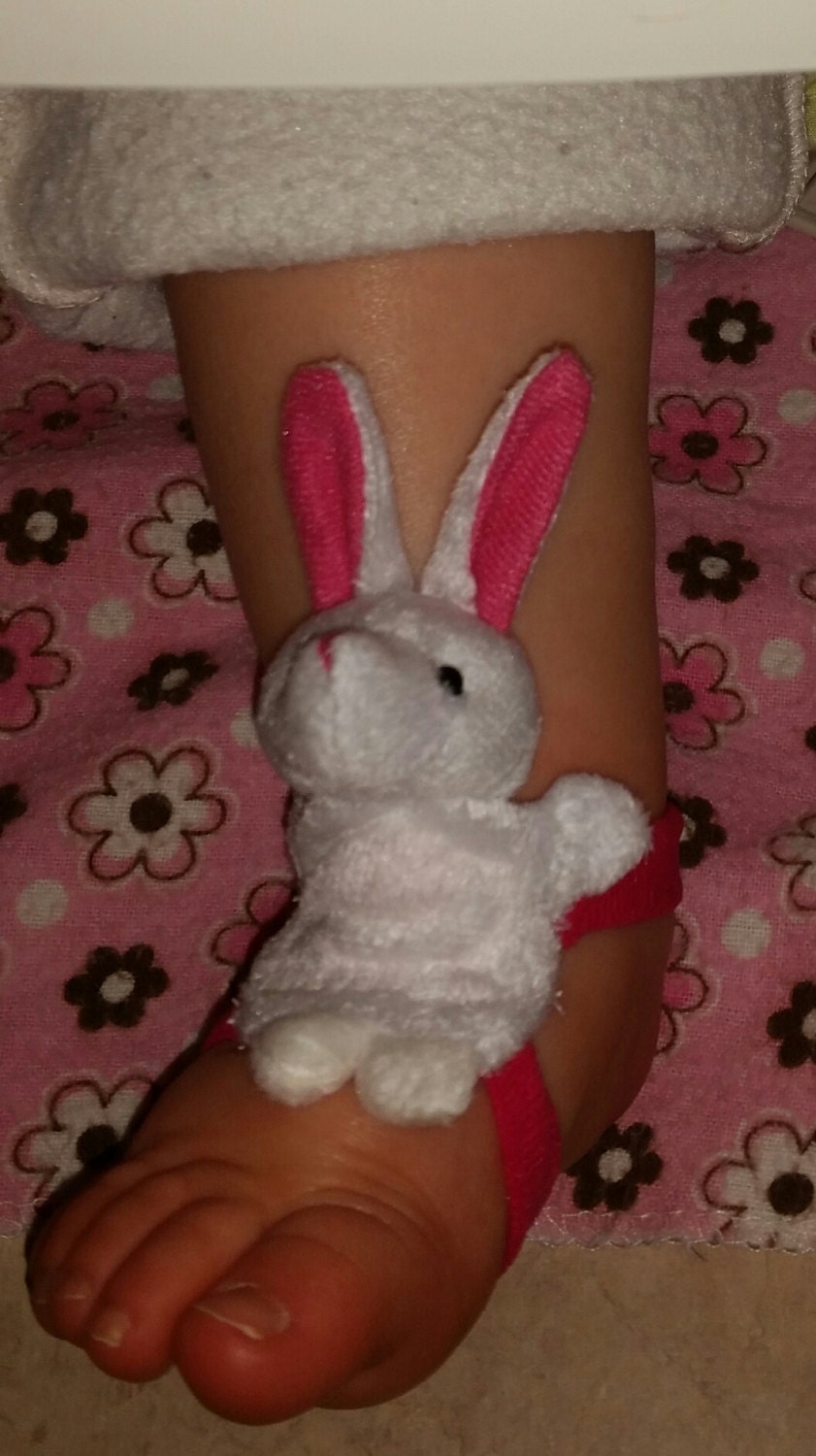 Adorable Baby Footsies for boys and girls that rattle.