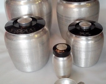 Vintage 1950's Kromex Spun Aluminum and Black Hard Plastic Flour, Sugar, Coffee & Sugar Canisters +