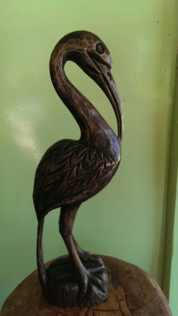 Hand carved wooden pelican bird. Beautifully detailed and