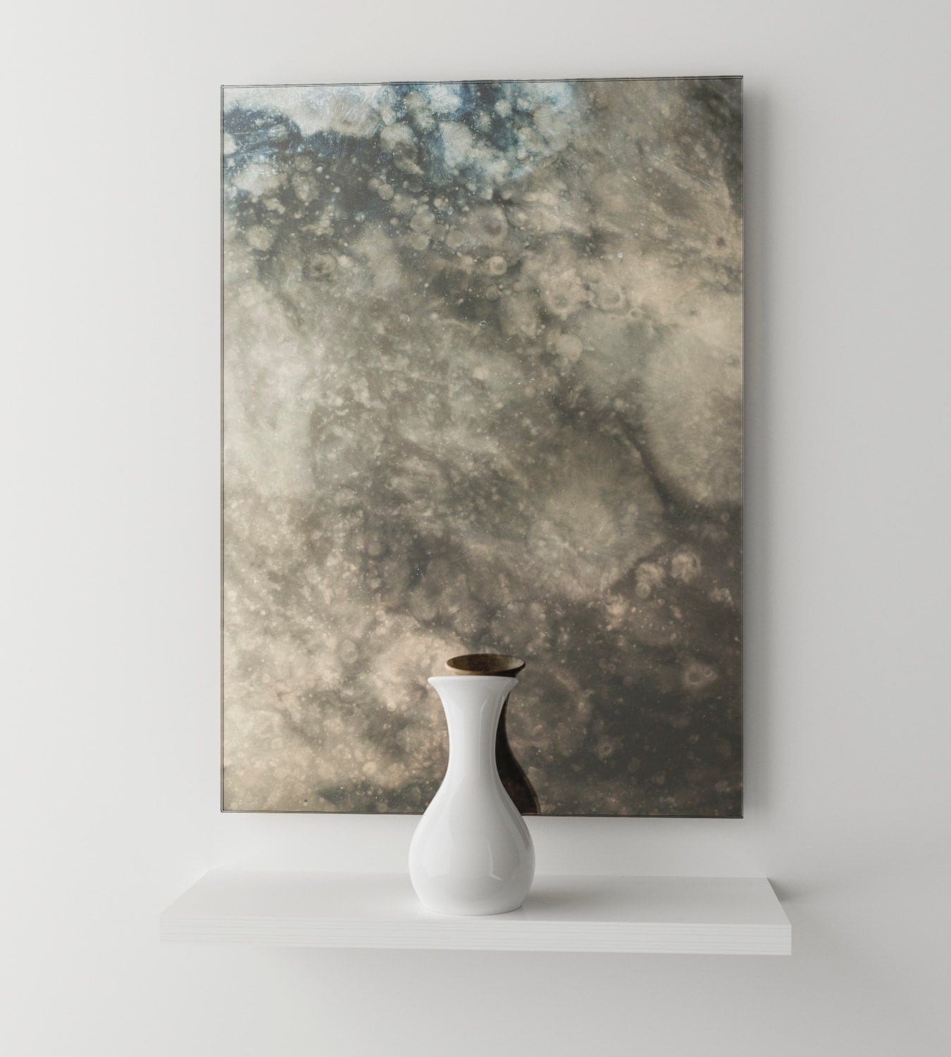 Dark smoked antiqued mirror. Interesting cloudy antiqued