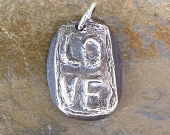 Organic, fine silver LOVE pendant or charm.