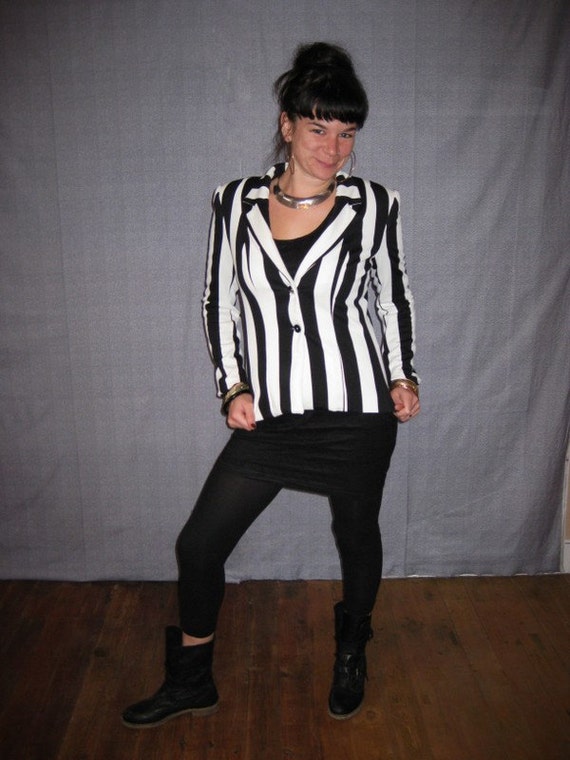 Woman with beetlejuice stripes jacket