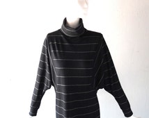 Popular items for batwing shirt on Etsy