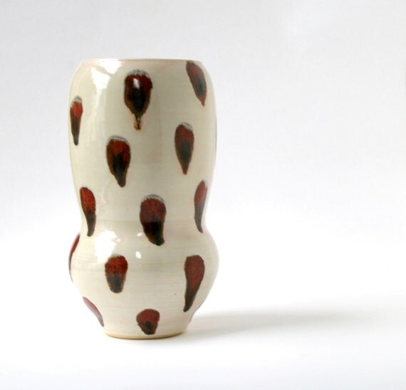 Curved White Vase with running glaze spots and pink overtones