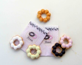 Pon de ring donuts with paper bags