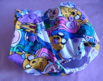 SassyCloth one size pocket diaper with Adventure time characters cotton print. Made to order.