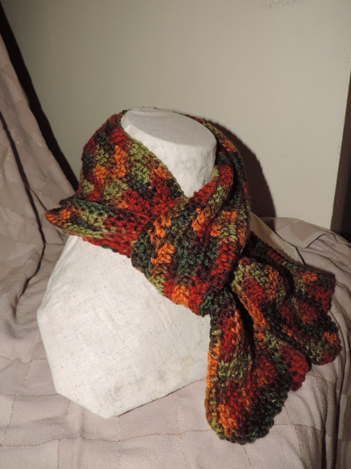 Crochet scarf dark green and multi color synthetic yarn.