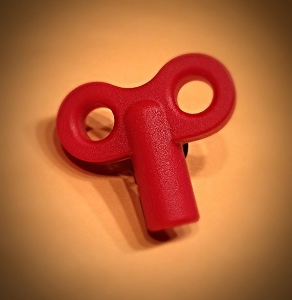 Toy Wind Up Key Pin by AMorbidTale on Etsy