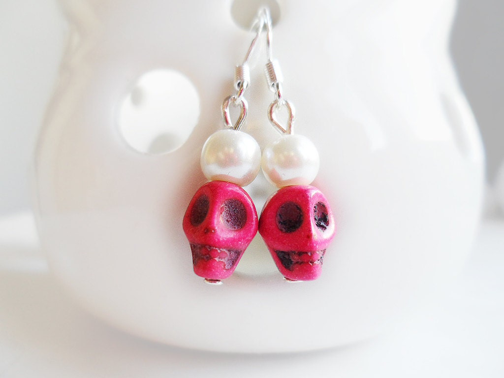 Pink vintage style skull earrings with ivory glass pearls and silver hooks