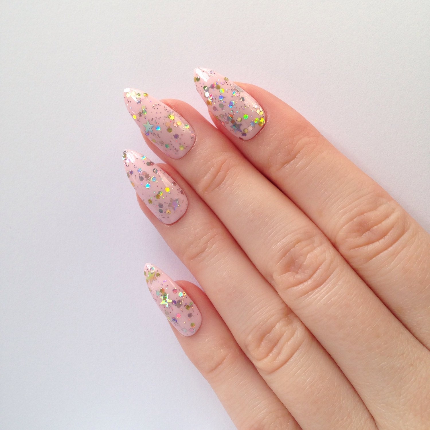 Pastel pink glitter stiletto nails Nail by prettylittlepolish