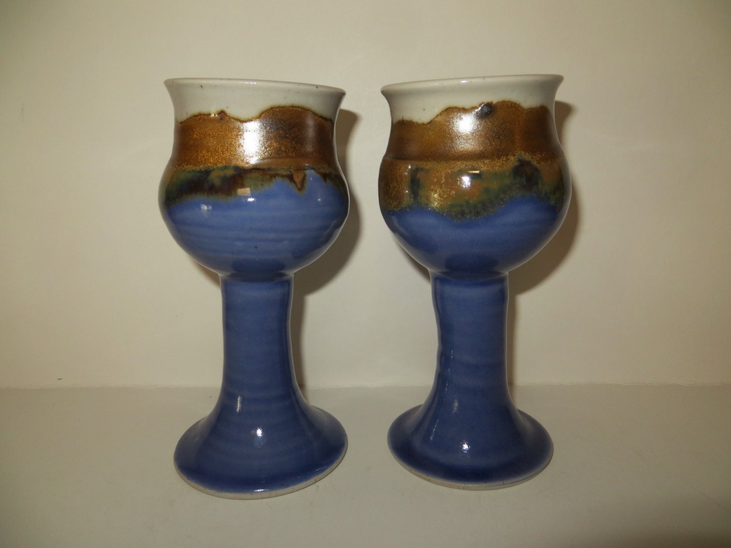 two wine glasses pottery ceramic stoneware vintage blue cream