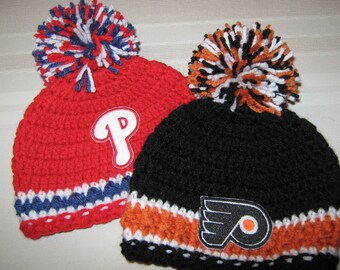Crochet Beanie Baby Hat (Philadelphia Flyers) Embroidered Logo - Black, Orange and White with embroidered Flyers logo and large pom pom