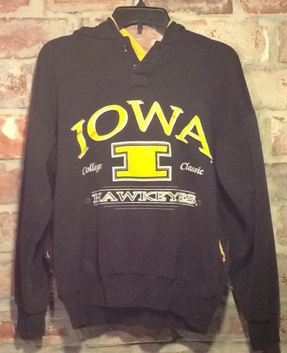 Vintage Iowa Hawkeye hooded sweatshirt by Dodger. Black and
